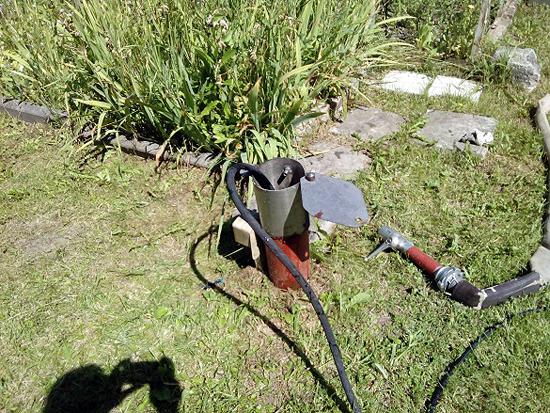 устранение засора через прочистку на улице